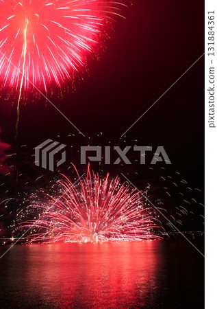 Fireworks over the lake coloring the night sky - Scenes from the Kashima City Fireworks Festival 131884361
