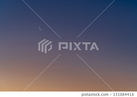 A crescent moon (thin moon) visible during the daylight hours 131884418