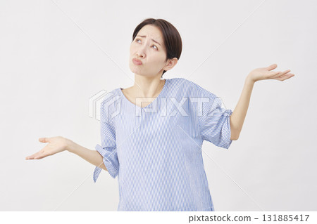 Woman middle-aged giving up gesture white background Woman middle-aged giving up gesture white background 131885417