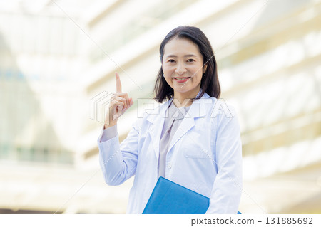 Smiley female doctor Smiley female doctor 131885692