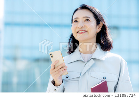 Woman dressed in work clothes Woman dressed in work clothes 131885724
