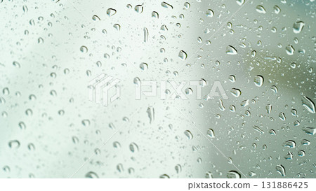 Abstract focus to blur of drop water. Drop of water on the glass after rainy. 131886425