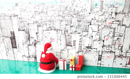 Santa Claus looks at the city blueprint and plans his gifts 131886445