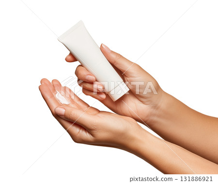 Soft skincare cream being squeezed from white tube into clean female hand, gentle moisturizing moment with soft lighting and natural skin tone Soft skincare cream being squeezed from white tube into clean female hand, gentle moisturizing moment with soft lighting and natural skin tone 131886921