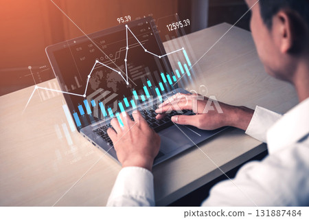 Business professional analyzing financial data with laptop, charts, graphs, and numbers reflecting market trends and performance metrics in modern workspace Scalp Business professional analyzing financial data with laptop, charts, graphs, and numbers reflecting market trends and performance metrics in modern workspace Scalp 131887484