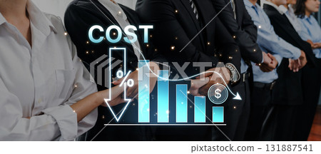 Business professionals collaborating on financial strategy analysis with downward cost trend graph and blue bar charts in modern office setting Trope Business professionals collaborating on financial strategy analysis with downward cost trend graph and blue bar charts in modern office setting Trope 131887541