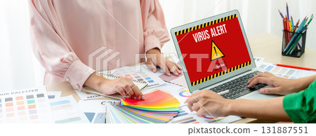 Virus warning alert on computer screen detected brisk cyber threat 131887551