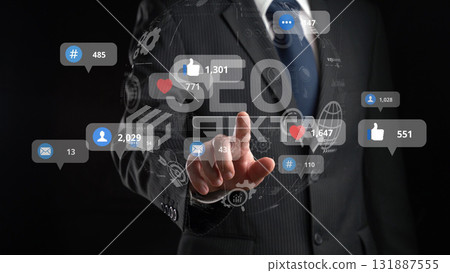 Professional Man Interacting with Digital SEO Analytics and Social Media Metrics Display for Audience Engagement and Content Optimization XDMCP Professional Man Interacting with Digital SEO Analytics and Social Media Metrics Display for Audience Engagement and Content Optimization XDMCP 131887555