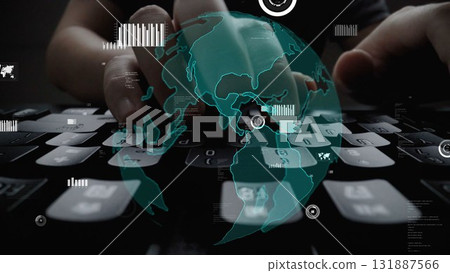Close-up View of Hands Typing on a Keyboard with Overlay of Global Map and Data Visualization Representing Digital Connectivity and Technology xenic 131887566
