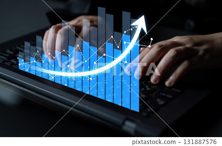 Modern Technology Concept with Hands on Laptop Keyboard and Graphical Data Charts Showing Financial Growth and Progress in Digital Environment Scalp Modern Technology Concept with Hands on Laptop Keyboard and Graphical Data Charts Showing Financial Growth and Progress in Digital Environment Scalp 131887576