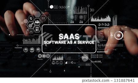 Hands Typing on Keyboard with Digital Elements Representing SaaS Concept and Data Analysis in Modern Technology Environment. Asymptotic smart data analytic Hands Typing on Keyboard with Digital Elements Representing SaaS Concept and Data Analysis in Modern Technology Environment. Asymptotic smart data analytic 131887641
