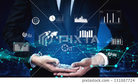 Businessman in Suit Presenting Data Analytics Graphs and Digital Charts with Advanced Technology in a Modern Office Environment xenic Businessman in Suit Presenting Data Analytics Graphs and Digital Charts with Advanced Technology in a Modern Office Environment xenic 131887724