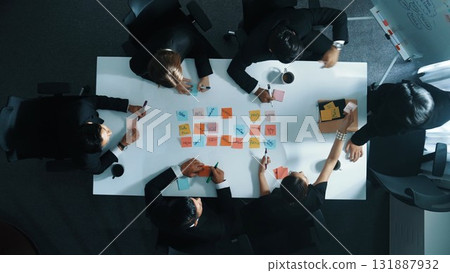 Top view of skilled business group choosing marketing strategy. Directorate. Top view of skilled business group choosing marketing strategy. Directorate. 131887932