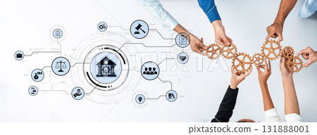 Collaboration and Teamwork in Financial Services with Gears and Symbols Representing Law and Business Concepts in a Modern Office Environment Trope 131888001