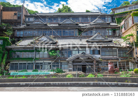 The exterior of an abandoned inn The exterior of an abandoned inn 131888163