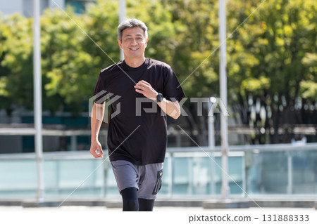 Senior man jogging 131888333
