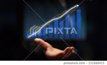Hands Presenting Digital Chart with Colorful Bars and Line Graph Illustrating Growth and Progress in a Business Environment Copula 131888415