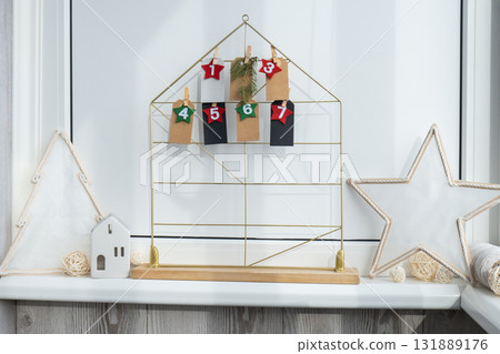 Step by step instruction of making handmade Christmas advent calendar. Creative craft homemade decor. New year celebration. Winter Step by step instruction of making handmade Christmas advent calendar. Creative craft homemade decor. New year celebration. Winter 131889176