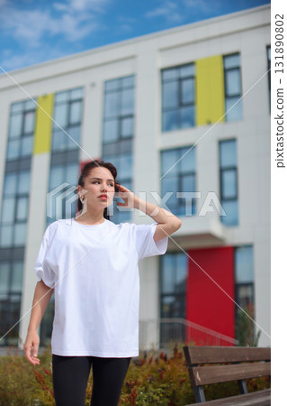 Exploring Contemporary Urban Fashion Encompasses Style and Elegance in Daylight A Chic Outdoor Look 131890802