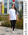 Exploring Contemporary Urban Fashion Encompasses Style and Elegance in Daylight A Chic Outdoor Look 131890847