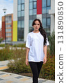 Exploring Contemporary Urban Fashion Encompasses Style and Elegance in Daylight A Chic Outdoor Look 131890850