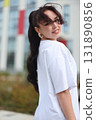 Exploring Contemporary Urban Fashion Encompasses Style and Elegance in Daylight A Chic Outdoor Look 131890856