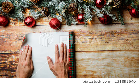 Christmas gift paper unfolding background Christmas gift paper unfolding background 131891640
