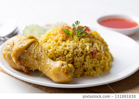 Thai Biryani rice with chicken and chili sauce on white background Thai Biryani rice with chicken and chili sauce on white background 131891838
