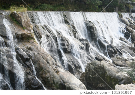 Flowing water from Nagashino Dam 131891997