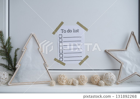 Paper note with inspirational TO DO CHECLIST with natural zero waste homemade Christmas decor. Happy new year promises resolutions. Self growth and personal development Paper note with inspirational TO DO CHECLIST with natural zero waste homemade Christmas decor. Happy new year promises resolutions. Self growth and personal development 131892268