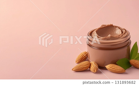 Natural almond nut extract clay mask on glass jar for skincare ingredient Natural almond nut extract clay mask on glass jar for skincare ingredient 131893682