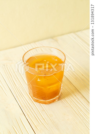 Delicious sweet drink tamarind juice and ice cube 131894317