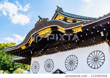 Yasukuni Shrine, Tokyo: The worship hall and cherry blossoms 131895408