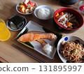 A classic Japanese breakfast menu: A morning set featuring grilled fish (salted autumn salmon) (includes pork miso soup, a small side dish, and dessert) 131895997