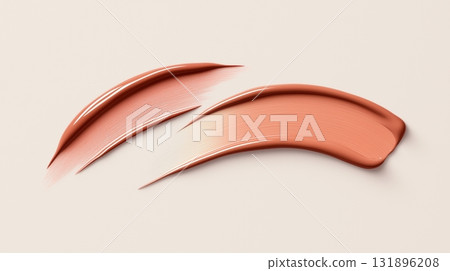 Smooth brush strokes of peach makeup foundation on light background 131896208