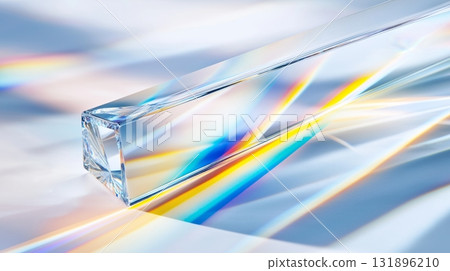Crystal prism with colorful light refractions on white background 131896210