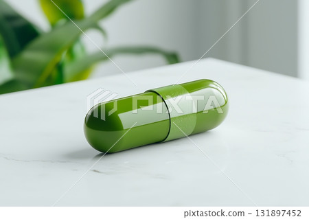 Green Capsule on Marble Surface Surrounded by Leaves in Natural Light Environment Green Capsule on Marble Surface Surrounded by Leaves in Natural Light Environment 131897452