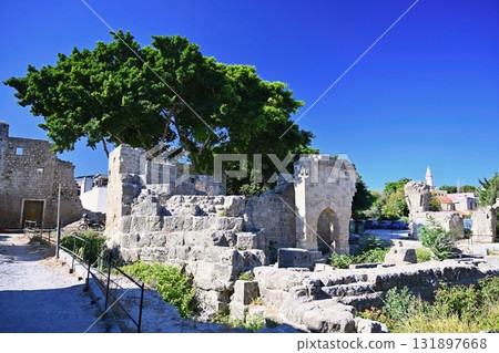 Beautiful old town of Rhodes on the Greek island of Rhodes. Beautiful historical architecture with castle, shops and cafes. Concept for travel and vacation. 131897668