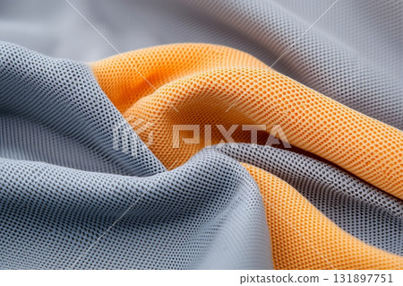 Close-Up of Textured Fabric with Gray and Orange Color Combination for Design Projects 131897751