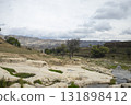 Scenic rocky landscape with a mountain water stream under a cloudy sky. Nature, outdoor adventures, and serene countryside retreats. Travel and tourism visuals. Trekking, camping 131898412