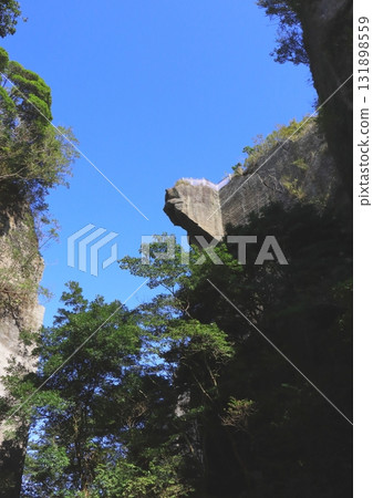 Rock Peeking into Hell (Japanese Temple on Mount Nokogiri, Kyonan Town, Chiba Prefecture, vertical composition) 131898559