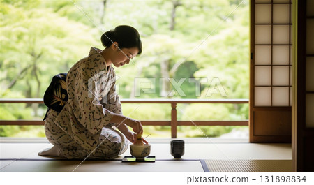 Japanese woman in kimono experiencing tea ceremony 131898834