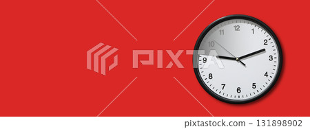 Clock against a red background, space for text Clock against a red background, space for text 131898902
