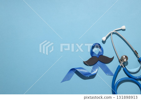 Blue ribbon for prostate cancer awareness with stethoscope 131898913
