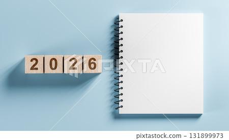 2026 year goals concept with wooden blocks and blank spiral notebook for action plan and to-do list on blue background 2026 year goals concept with wooden blocks and blank spiral notebook for action plan and to-do list on blue background 131899973