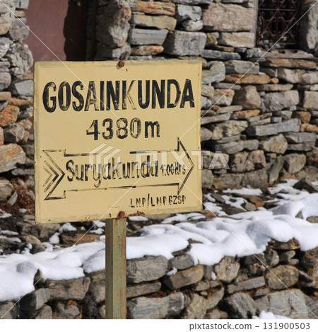 Directional sign in Gosainkunda, Nepal. 131900503