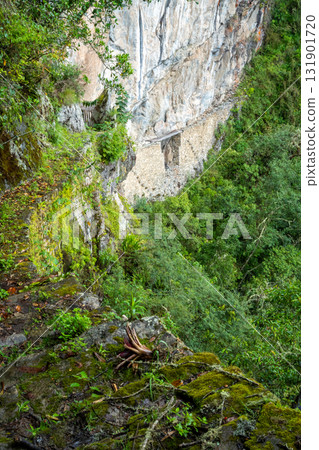 Inca Bridge - Puente Inca - on the Machu Picchu site, a hidden pathway in Peru 131901720