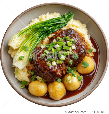 Tender Braised Veal Cheek with Madeira Glaze Served on Creamy Celery Root Mash and Roasted Green Onions 131901868