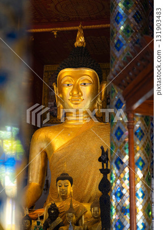Golden Buddha Statue in Temple Hall in Thailand Golden Buddha Statue in Temple Hall in Thailand 131903483