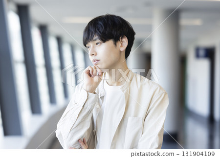 Thinking young man Thinking young man 131904109